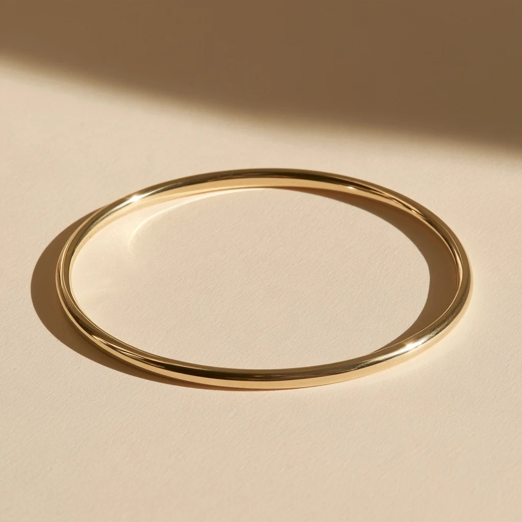 Illustrative bracelet — Yellow gold · Slim bangle