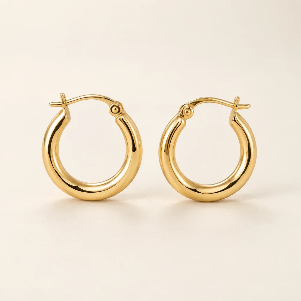 Illustrative earrings — Yellow gold · A matching pair